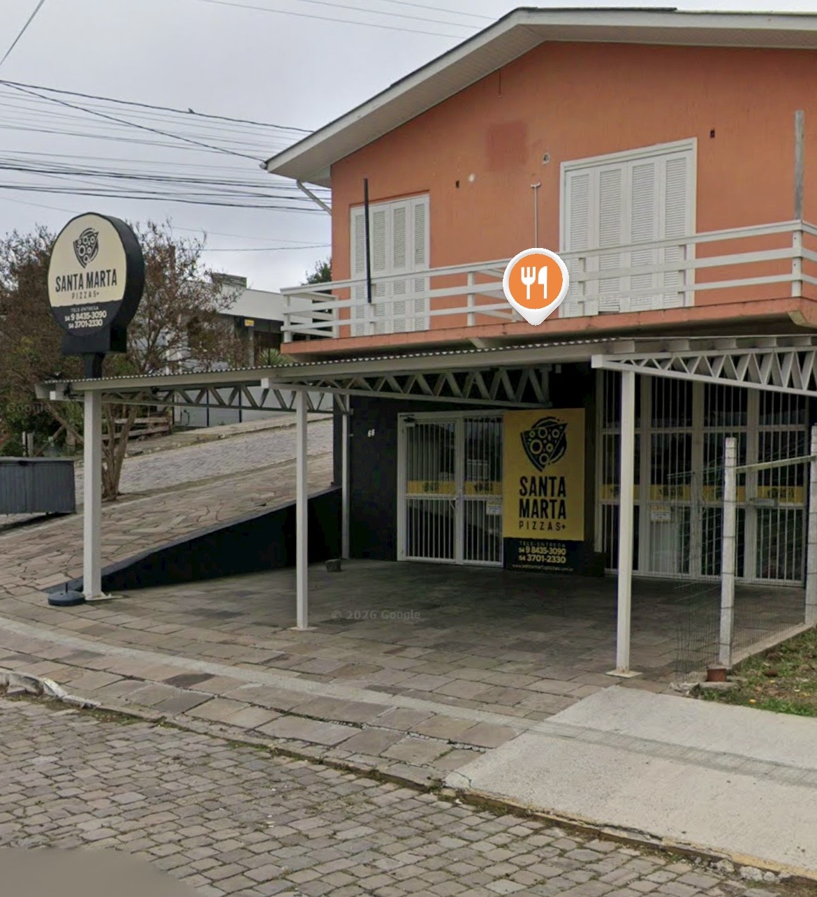 Fachada da loja Santa Marta Pizzas